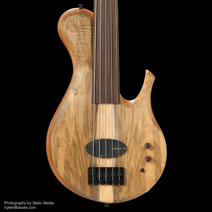 XylemBassGuitar's tweet photo. #bass #fretless #5string #instrument #bassguitar #music #artwork #artist #woodworking #imagery #photography #photographicart #luthier #meaning #bassfest https://t.co/8YNcusTZHE