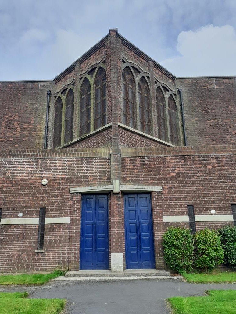 Behind our huge, 1930s blue doors is peace and quiet and an amazing stained glass window.

#ChurchDoorChallenge