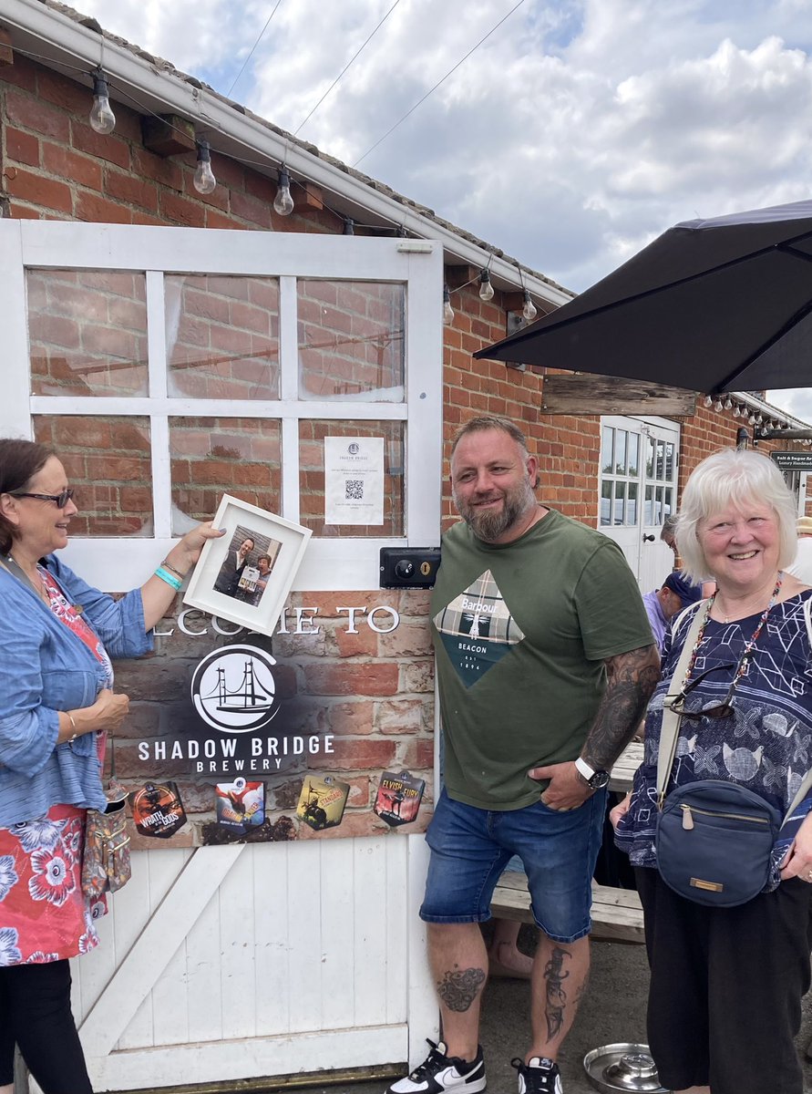 Mand_West's tweet photo. As today @anniehornerglis and I are attending the @folk_lincs Humber Fest, it felt apt to present our local #shadowbridge brewery with a framed photo I took of the folk stars that are @boden_jon @squeezyjohn with a gift box of beer we gave them in early spring.. 1/2 https://t.co/iyZUnk3i38