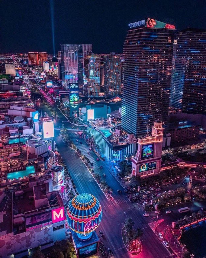 "Lost in the electric embrace of Sin City's skyline. ⚡️🏙️ #LasVegasLights #UrbanEuphoria #CityscapeDreams"