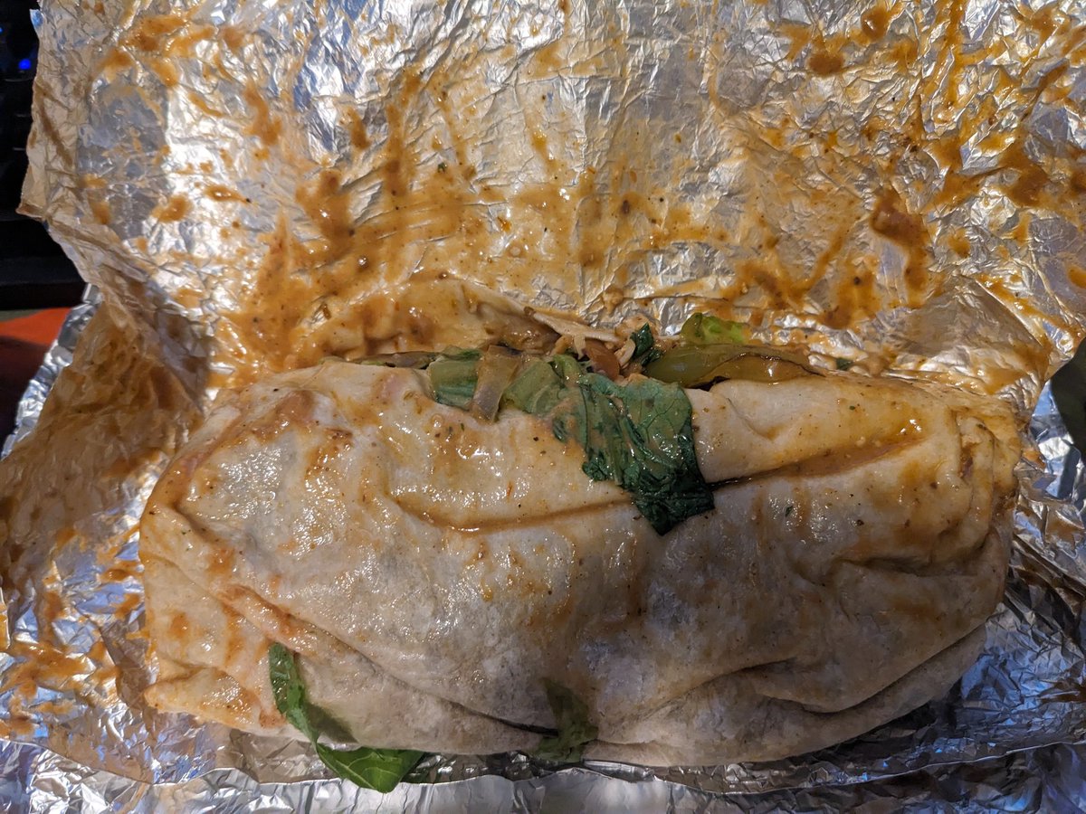 Sholva_Derg's tweet photo. Hey @ChipotleTweets I tried using Pepper and it was completely useless again. 

What the hell is up with this burrito? Double wrapped so it doesn't leak in the bag all because they were too lazy to get a new tortilla after ripping it? Would have ordered a bowl if I wanted this. https://t.co/qBzUDxYphH