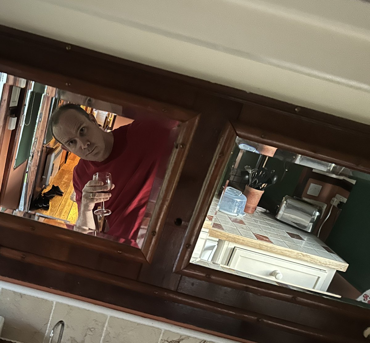 mattfromlondon's tweet photo. I’m staying in an Edwardian train carriage and have managed to trap myself in one of its haunted original mirrors. Please help. https://t.co/JvKDTDUeBJ