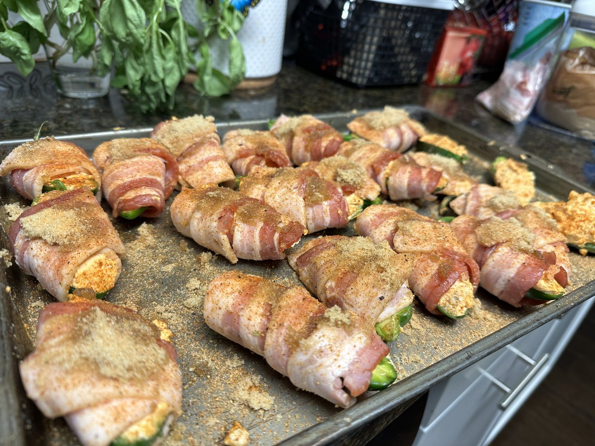 UNCballislife's tweet photo. Go ahead and blame me for a little more global warming today, my friends. #SorryNotSorry @MeatChurch @TraegerGrills #buffalochickenpoppers #baconfordays https://t.co/w7s5KqRiSE
