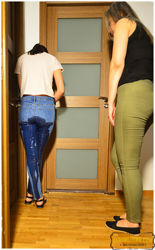 Realwetting's tweet photo. A boring day in the office proved to be exciting and they found themselves desperate after a long meeting and to their surprise the bathroom was occupied. After knocking and squirming for a while, a dark wet spot started developing on Debbie’s right leg. Claudia follows shortly. https://t.co/pODu2Wu71J