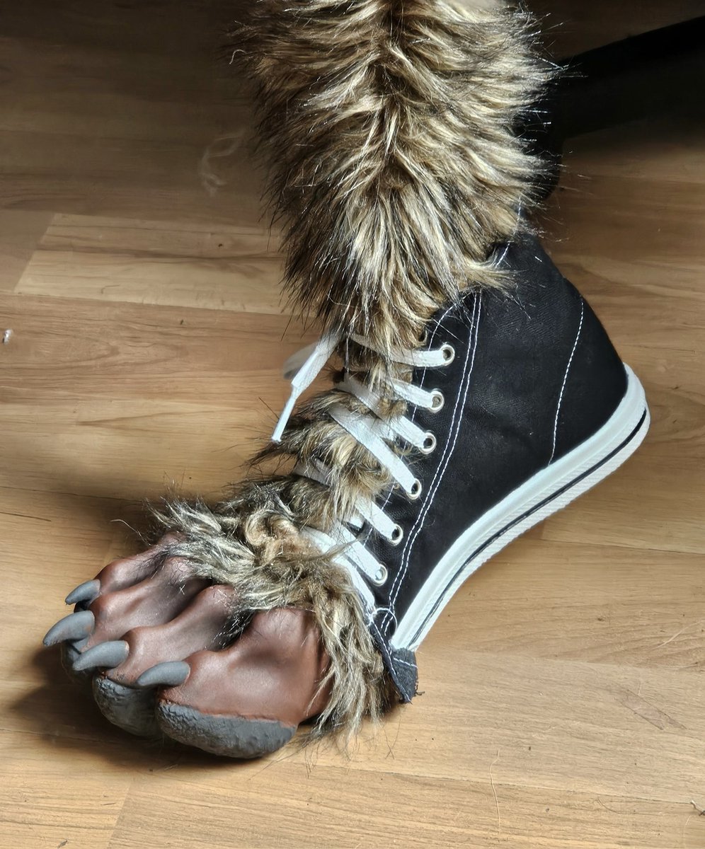 lobinez's tweet photo. Growing pains, a werewolf feet update. This is just a test, but I like this concept of paws bursting through shoes, surprisingly comfortable to walk with them. 

Toes will be matched in colors to the fur, and maybe gluing some fur to better match it. 

Any advice for doing that? https://t.co/HvpCCii4nc