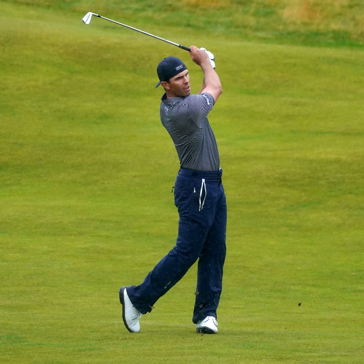 FootJoy's tweet photo. True Grit. 😤
Billy Horschel battled brutal conditions to fire a 69 in Round 3 of #TheOpen Championship.
Horschel will carry a one-shot lead into tomorrow’s Final Round at Royal Troon.
#FJPremiereSeries #StaSof https://t.co/ThzEhvM3at