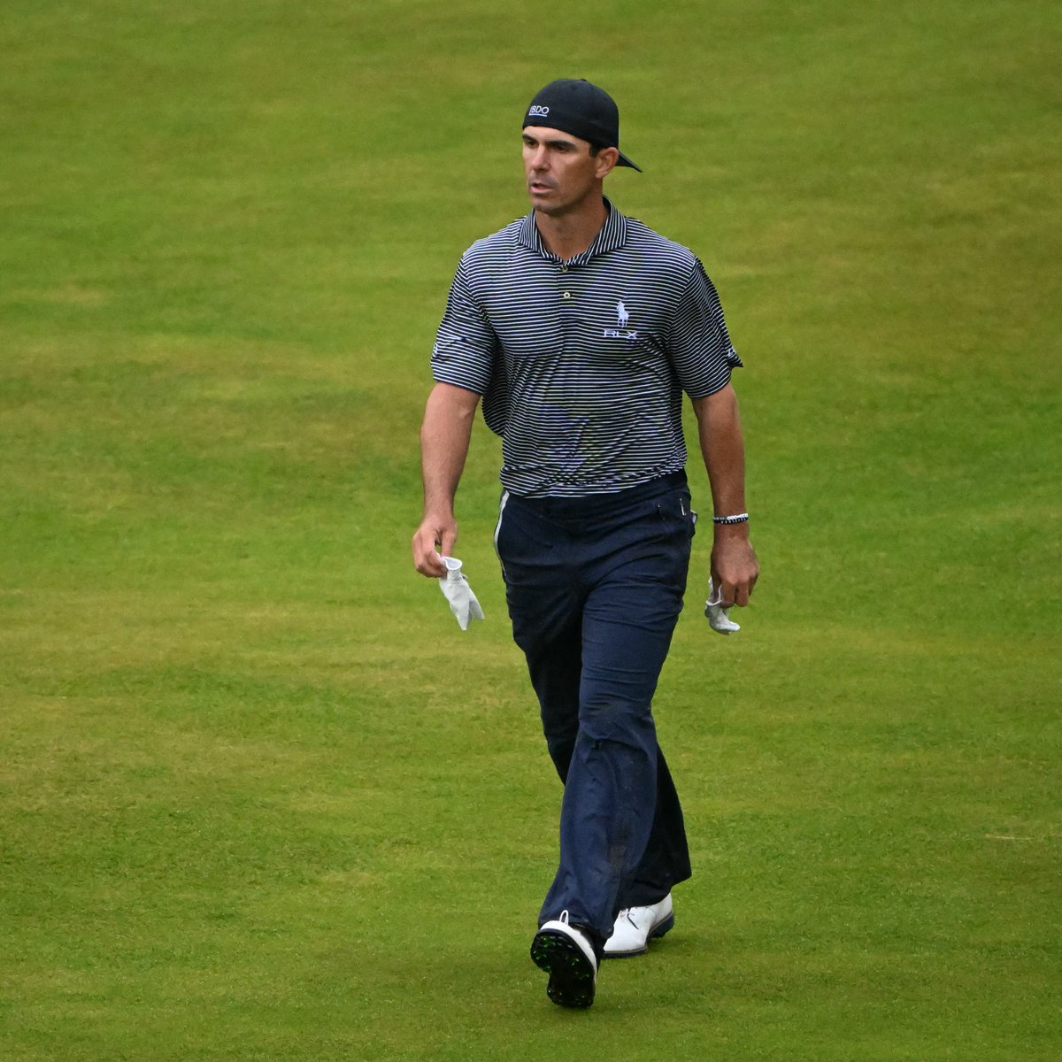 FootJoy's tweet photo. True Grit. 😤
Billy Horschel battled brutal conditions to fire a 69 in Round 3 of #TheOpen Championship.
Horschel will carry a one-shot lead into tomorrow’s Final Round at Royal Troon.
#FJPremiereSeries #StaSof https://t.co/ThzEhvM3at
