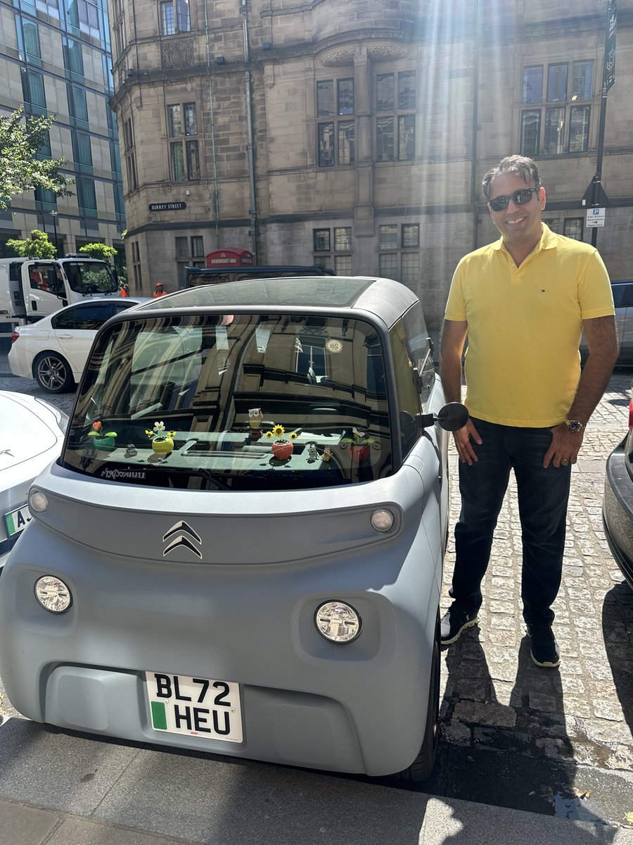 ara3635's tweet photo. Standing next to this tiny Citroën electric car, I feel like Gulliver in Smurf Village! 🚗🔋 #GiantProblems #TinyCar https://t.co/8q2sd1kJkz