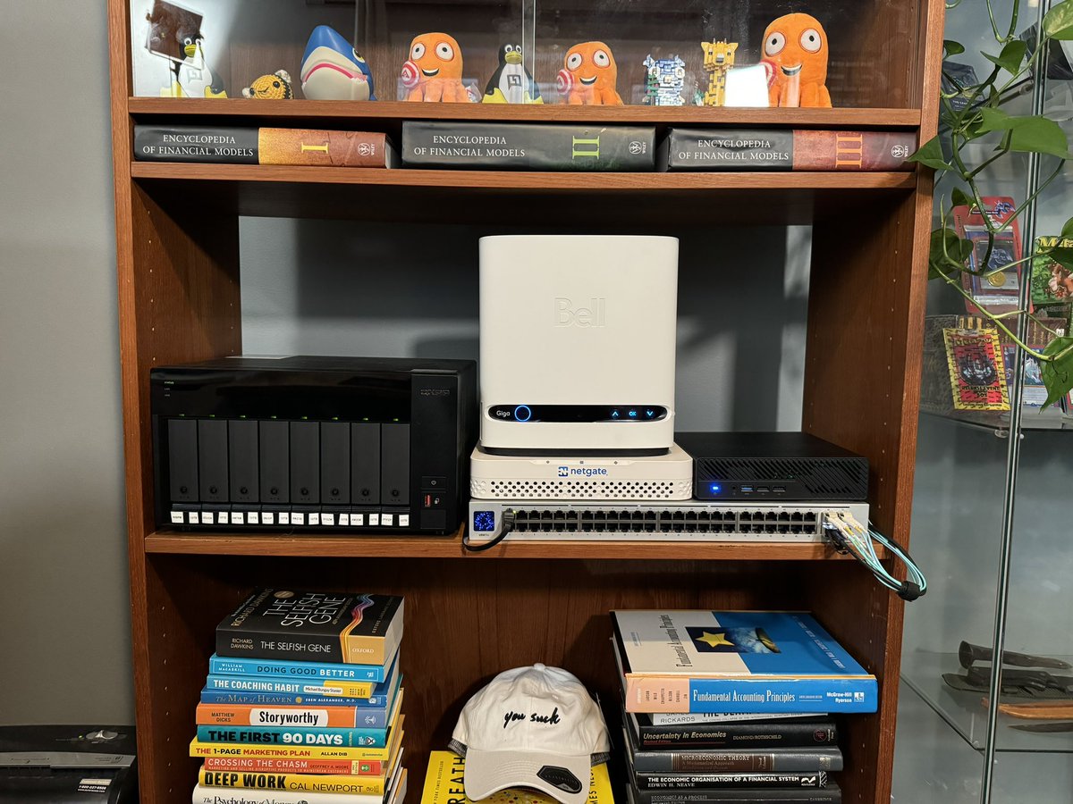 The transition from 24U server rack to a bookshelf homelab is nearly complete!