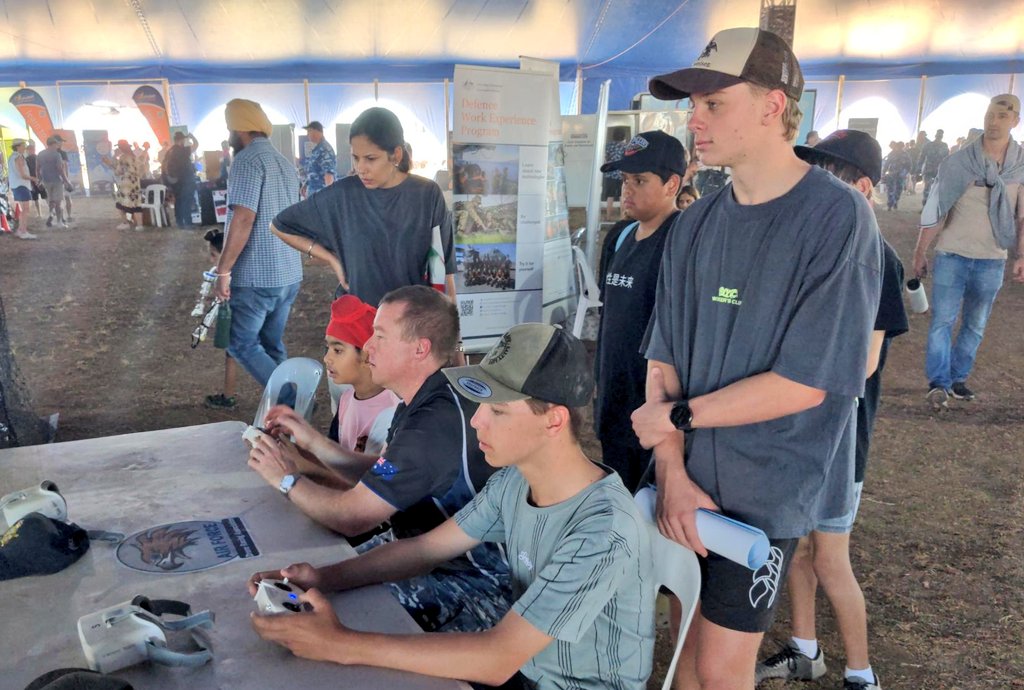 AUADRT's tweet photo. Our @AusAirForce #DroneRacing pilots were out in force at the RAAF #Darwin / #ExPB24 Open Day, #STEM'ing with 30,000 peeps in super dusty conditions. 
#SendIt!
@CAF_Australia @WOFFAF @ChiefAusArmy @marieclareNT https://t.co/aSDFy0vCsP