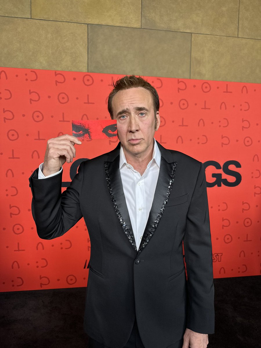 LonglegsFilm's tweet photo. Nicolas Cage with his ticket to the premiere. https://t.co/9dc0RGIScl