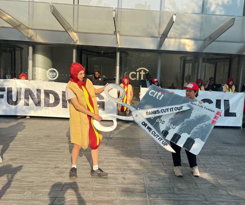 StopMoneyPipe's tweet photo. #BREAKING: Dozens dressed as @Costco hot dogs are at @Citibank’s HQ right now demanding that Citibank cleans up its act – or else risk losing one of its largest credit card clients: Costco. #SummerofHeat https://t.co/j5KyZ8kH5Y