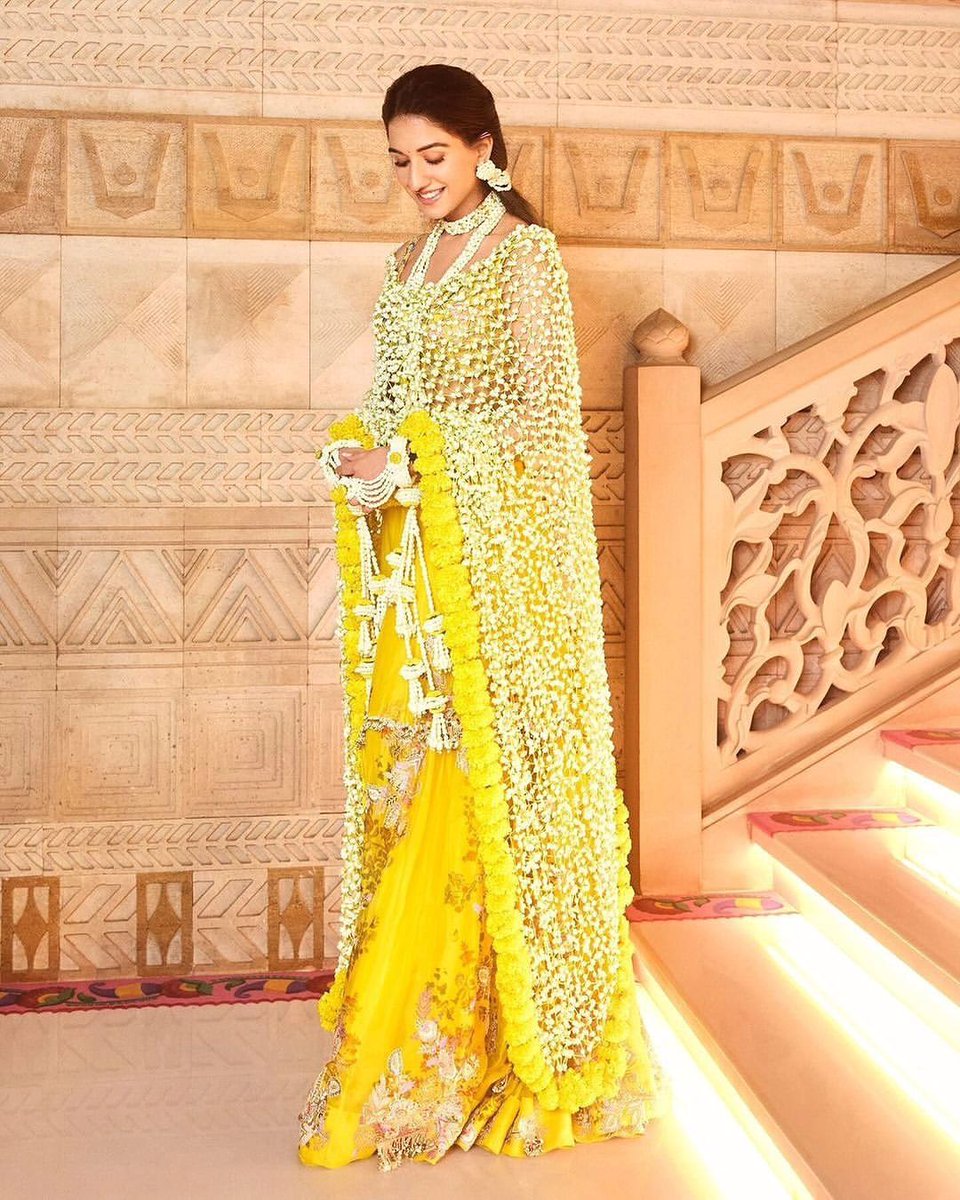 shaadi_fever's tweet photo. Radhika Merchant shines in a yellow Anamika Khanna outfit with real flower odhni, for her haldi ceremony. 
Read more- https://t.co/DEQuoVtg9W 
#RadhikaMerchant #AnantAmbani https://t.co/5XwMrRWe4n