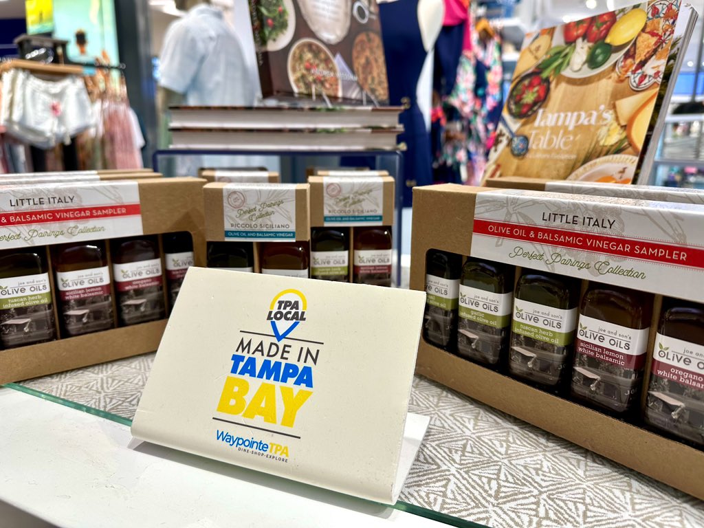 FlyTPA's tweet photo. MADE IN TAMPA BAY: If you’re passing through TPA and need a gift or souvenir, stop by The Shoppes at Bayshore in the Main Terminal to snag something from a local provider! From coffee to jewelry to shirts and more, you’ll find a variety of Tampa Bay treasures. 🛍️❤️ https://t.co/I2wjD0FUQI