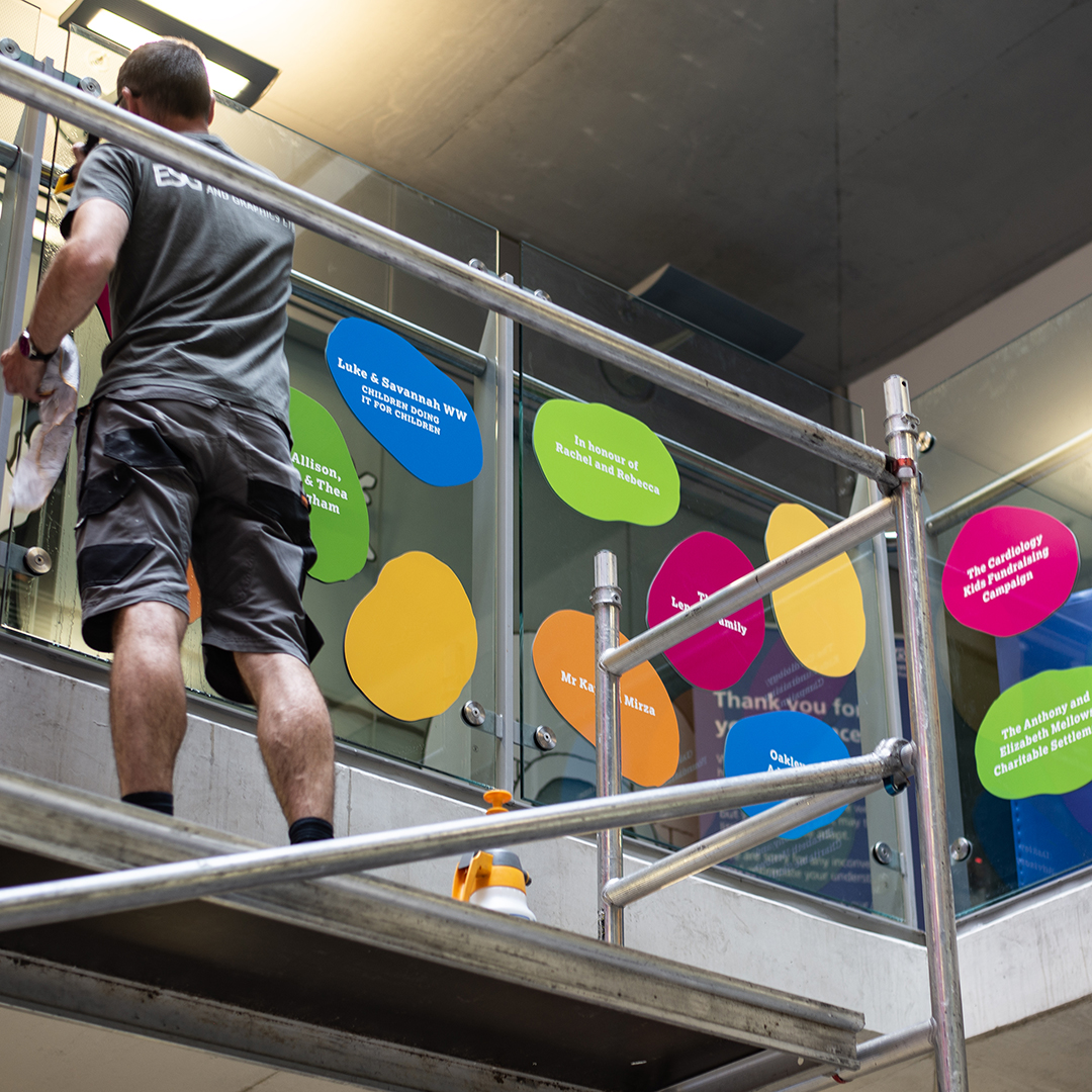 For Evelina London Children's Hospital; a colourful, fun installation helping to make the environment reassuring for sick children. 130 (and still growing) ‘thumbprints’ applied to the central atrium, acknowledging donor names. #supergraphics #environmentalgraphics #placemaking