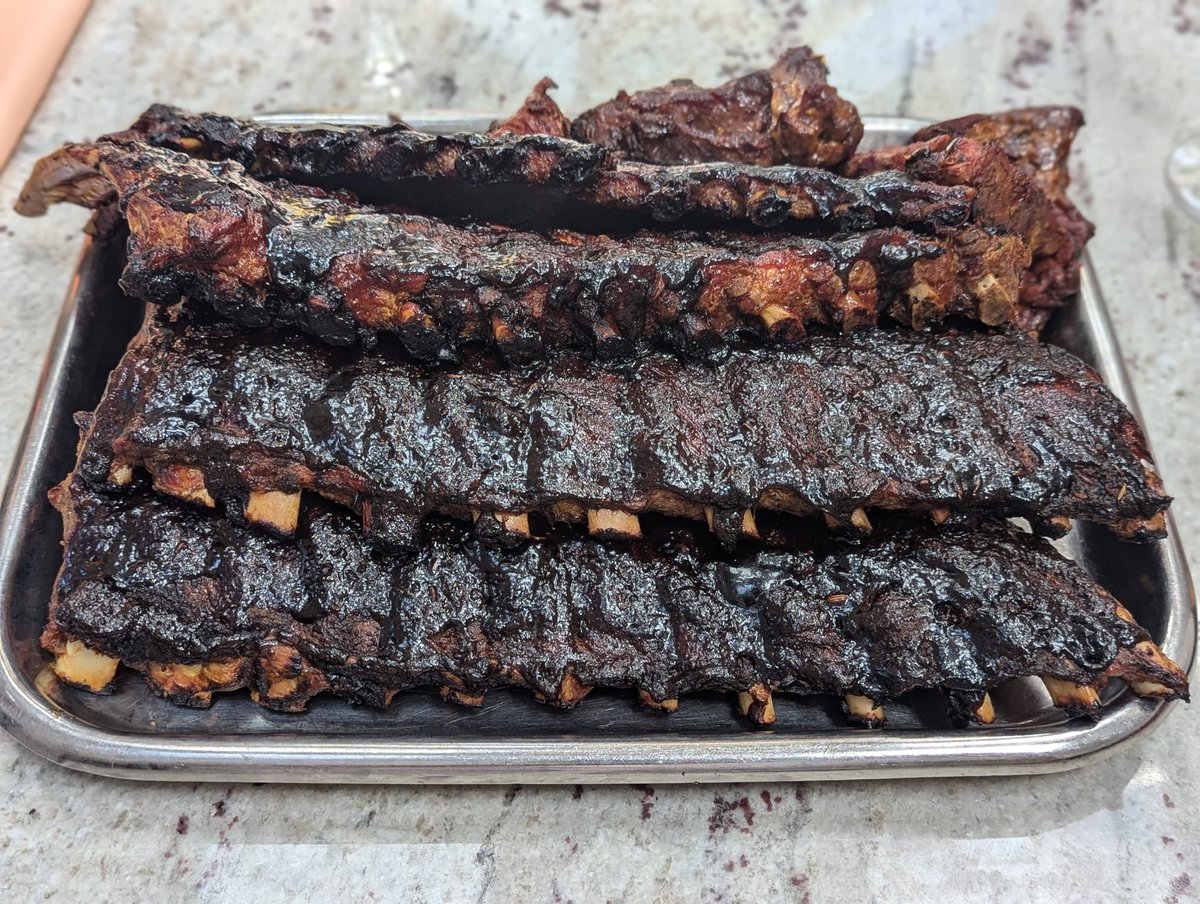 The weather isn’t great, but slowly smoked baby back pork ribs certainly help lift the spirits. Sprayed with a little whiskey too.