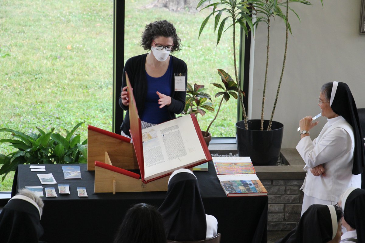 DOL_ca's tweet photo. Today we were thrilled to host a copy of the St. John's Bible from the Diocese of Hamilton. Staff and our very special guests, the Sisters of the Precious Blood, were able to spend time with archivist Bridget Ker and this wonderful work of faith and art. https://t.co/AyQ8GTCzKh
