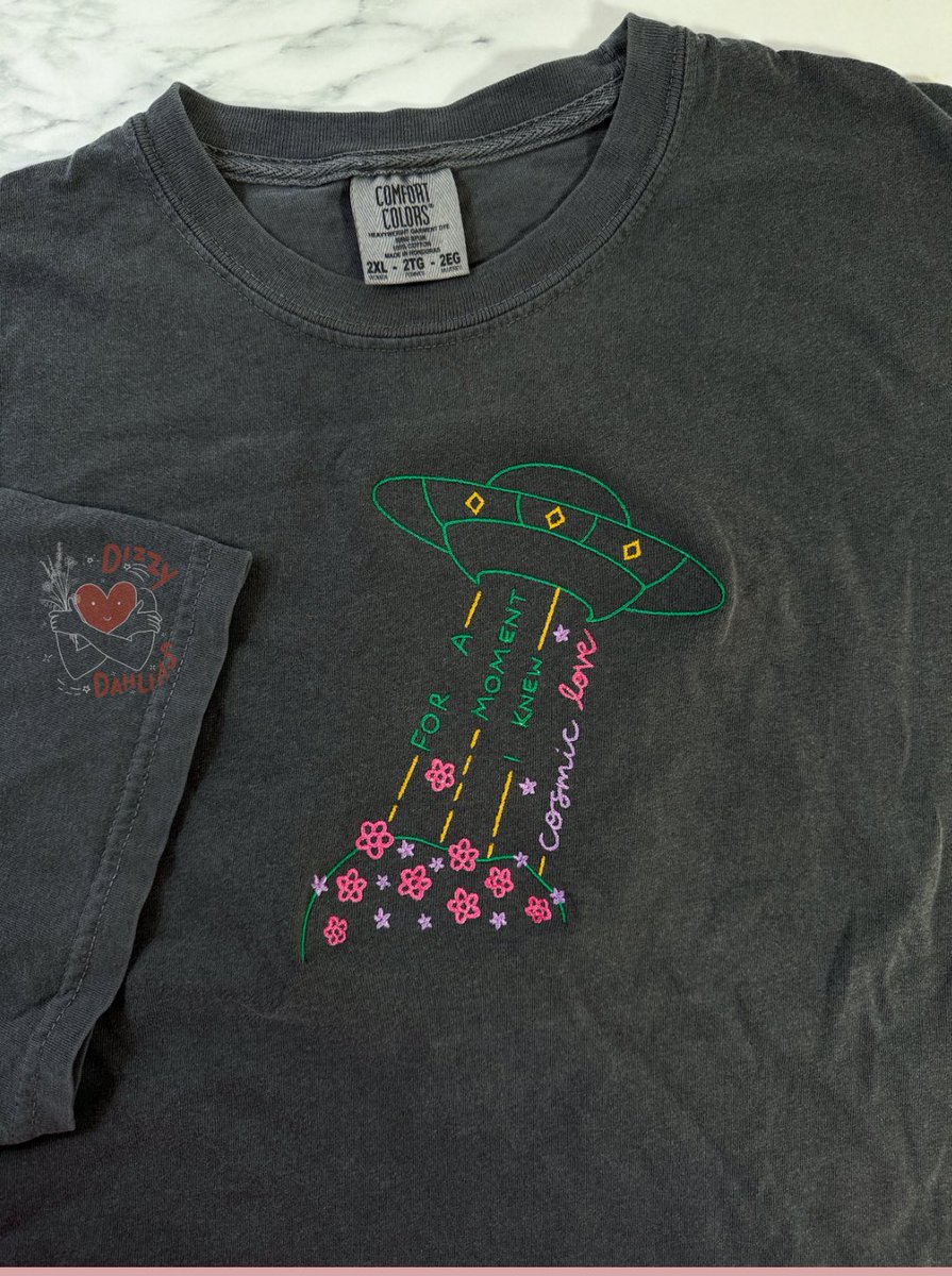 tinyshredofgold's tweet photo. so i just placed my order from my dear friends’ shop @DizzyDahlias and i literally can’t wait for it to come in!! her entire shop is 20% off today only

all her merch is the most amazing quality, is so comfy, and i always get compliments 🩷 support small swiftie businesses! https://t.co/H3JOopUIJl