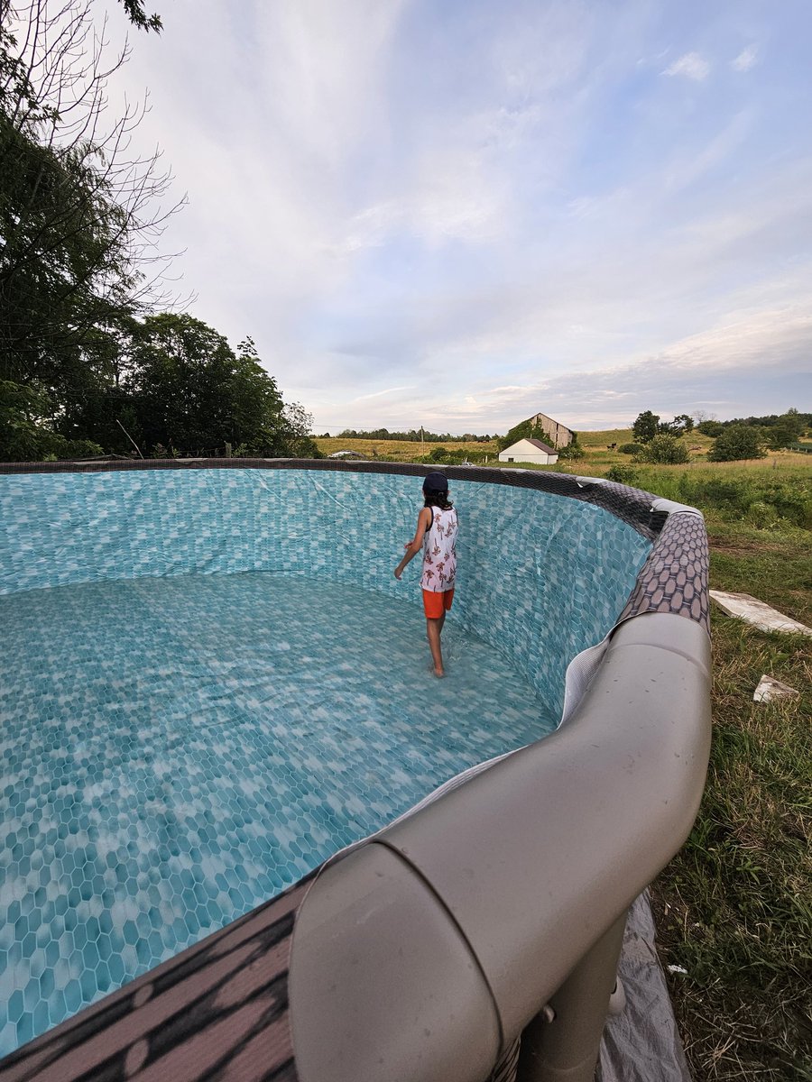 perduproject's tweet photo. Getting our families pool set up on this super hot day 😁 @wilkjef. It's a deeper pool this year, and it looks like our son Keenan better put those swimming lessons to use and keep his chin up 🤣 https://t.co/Fs1eDwtGjl
