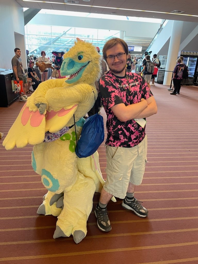 DigitRaptor's tweet photo. A few extra in-fursuit pictures I took at Anthrocon! Everyone in the photos were so sweet and friendly!  Already missing Anthrocon 😭🦖 https://t.co/1PECXvnvH3