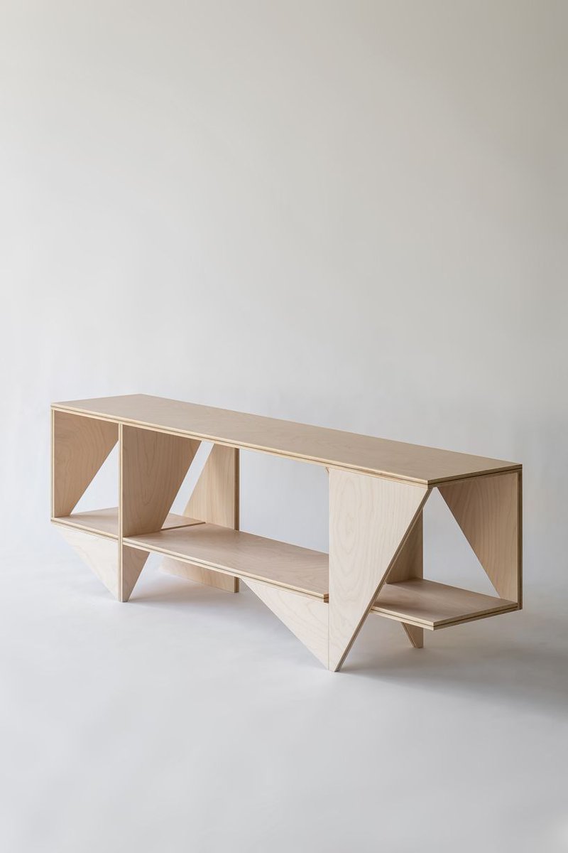 designboom's tweet photo. minimalist átló furniture series highlights the layered symbolism of diagonal lines https://t.co/3WS2K4aNkP https://t.co/fuEQ9qe6c4