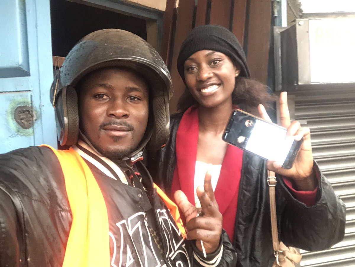 MbabaziFridah's tweet photo. Today, I met Sharif, @SafeBoda driver in Bukoto. He lent me his jacket, glasses, and headsock. Such incredible kindness and service! On our way , it started raining heavily, so I told him to park Somewhere and we had tea together.🤗 Thank you, Sharif. I hope we cross paths again. https://t.co/4qx6ehhDvD