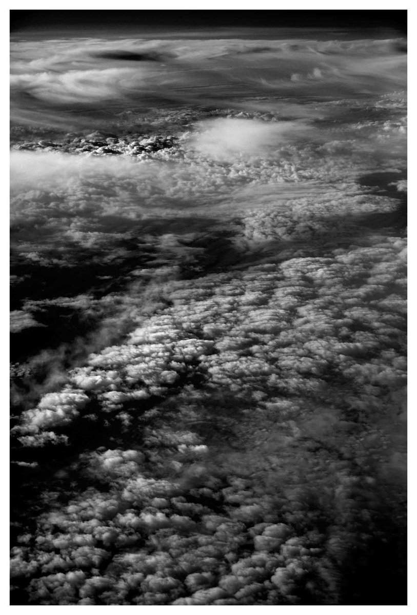 And_rew_Wilson's tweet photo. Up in the Clouds (Oslo series), 2015  I was fortunate on the flight back from Oslo to have golden-hour light shining down on whispy and fluffy clouds, providing me with scenic cloud-scapes to photograph. https://t.co/xnph6JYB8p