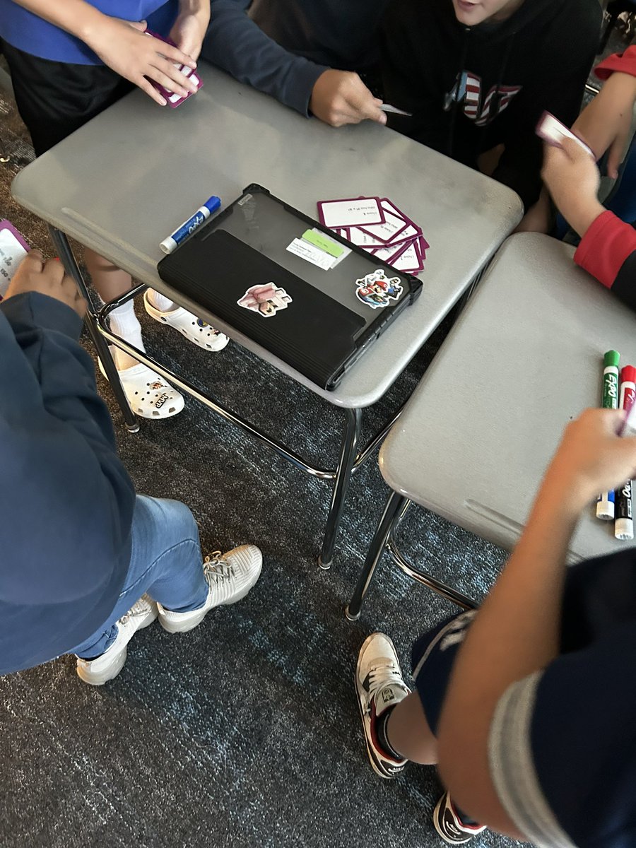 crafton_chase's tweet photo. A great way to start the year with some collaborative group work to review math concepts! @HerbertAkinsMS #MathRocks #MathisGreat https://t.co/pcXdUf28dP
