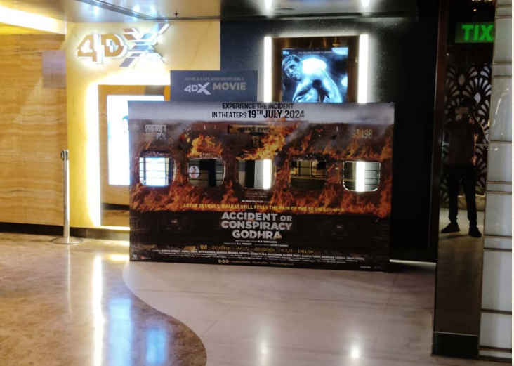 namdev_aks9835's tweet photo. Have you spotted the Godhra train poster yet? It's everywhere! ✨ Save the date: July 19th. Experience it at a cinema near you! 🎬 #GodhraFilm #July19 
#UnityOneMall 
#DLFAvenueMall
 #SelectCityWalk 
#DLFCityCenterMall
@TheBJpurohit @RanvirShorey @Mkshivaaksh @actormanojjoshi https://t.co/HoOqsYnPoy