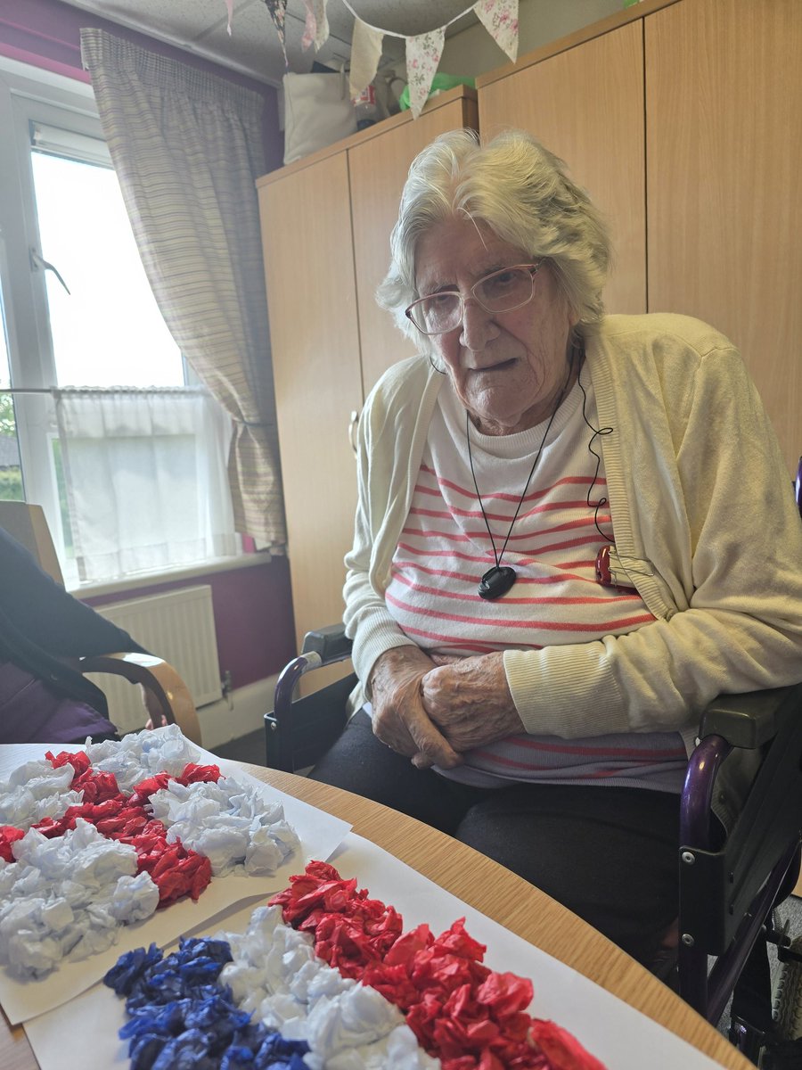 Two of our lovely residents help make 3D flags for tonight's game #Football #england #biltoncourt