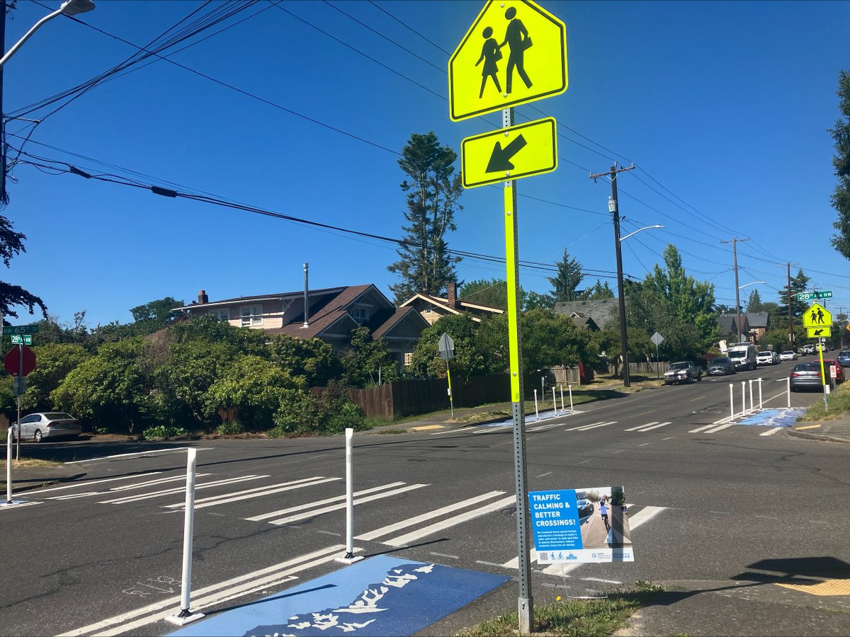 seattledot's tweet photo. Adams Elementary School students voted this "mountain" design as their favorite.

Colorful bulb-outs narrow the street near new crosswalks and speed humps.

📍NW 65th St between 26th and 28th Ave NW. https://t.co/03sfrOHAJ4