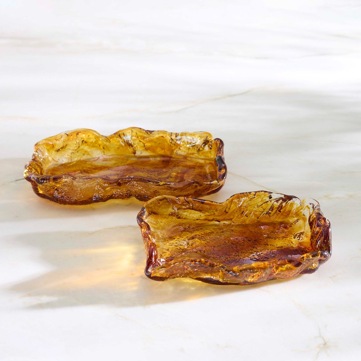 CyanDesignHome's tweet image. 🔥Introducing the Molten Collection: a beautiful showcase of the time-tested technique of sand casting. The textured glass produces a unique play of light, with imperfections that enhance its natural beauty.✨ #cyandesign #cyanspring24 #designoutloud