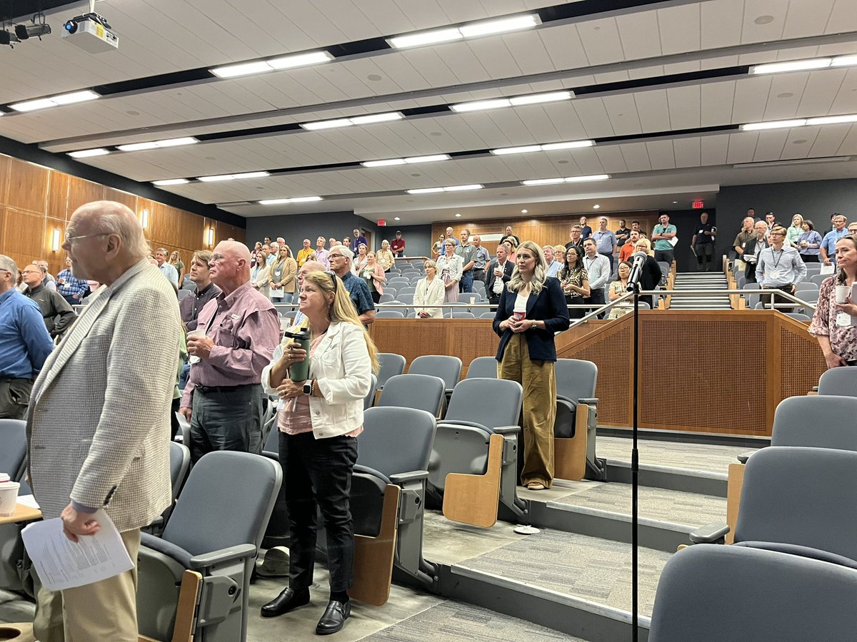 ifma2024's tweet photo. Jack Cocks from #NZ is a man who has faced true adversity and displayed resilience. But he asked us, who hasn’t. Who he laid it out, it turns out we all have, all those standing have faced adversity (no one seated). @IFMAOnline https://t.co/zn41eKFcsm