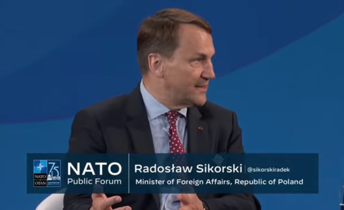 radeksikorski's tweet photo. NATO was funded 75 years ago to deter the aggressive Russia in the disguise of the Soviet Union. We won the first time and we have to win now. Russia is agressive again, she has broken the international law. Putin should not benefit from his act of aggression and it is our business to help Ukraine. 

| @NATO Summit panel discussion “European security transformed”