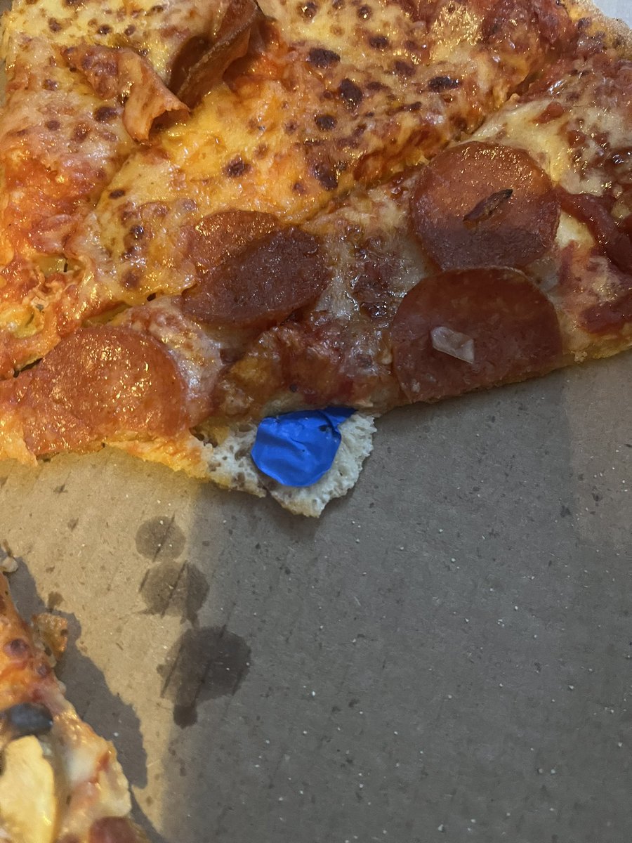 lainbo's tweet photo. Absolutely disgusting! I picked up a pizza from @fourstarpizza on the Beersbrodge Road in east Belfast. halfway through eating I noticed this plaster baked into the dough. The store denied repeatedly that it was theirs even though it is clearly baked in! @belfastcc @BelfastLive https://t.co/KnBvU5rStQ
