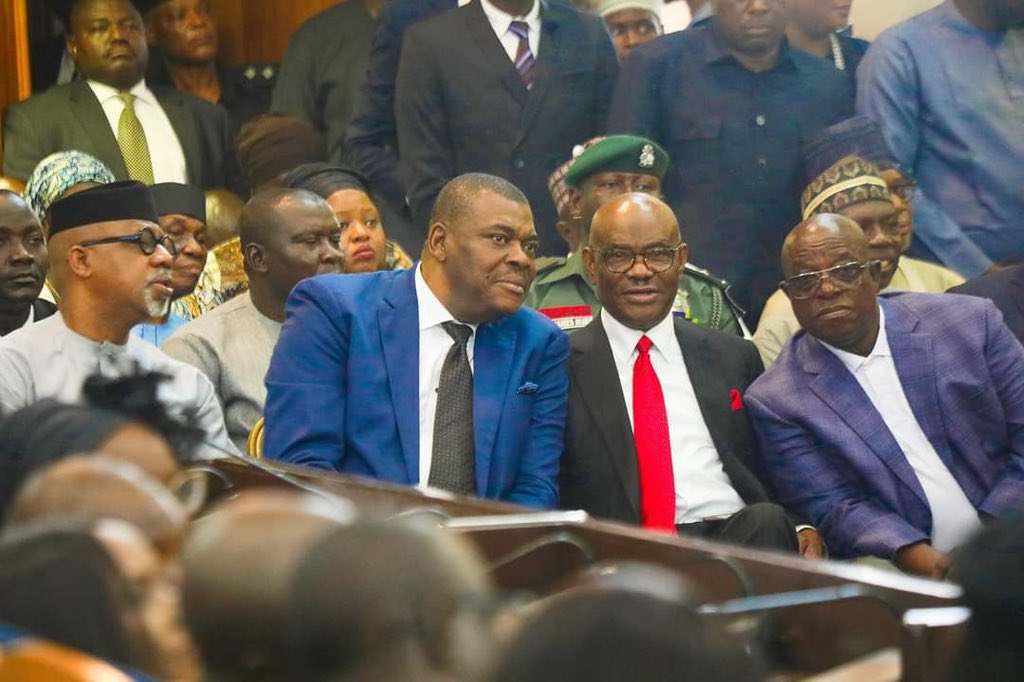 GeneralSnow_'s tweet photo. Nyesom Wike, Lover Of The Judiciary.

Whilst Nigerians bantered and laughed about Toyin Abraham’s arrest of Big Ayo, something grand was unfolding in Abuja. Nyesom Wike’s wife, Eberechi Suzzette, was appointed and sworn in as a Justice of the Appeal Court. The event was graced by high-ranking APC members, including governors, senators, and ministers, with Wike himself, now the FCT Minister, in attendance.

Though this appointment should be seen as a reward for hard work and years of service to the judiciary, one cannot help but notice the grand political undertones at play. As the governor of Rivers State, Wike built and handed over 24 duplexes to the judges in the state. Recently, as the FCT Minister, he announced the construction of 40 houses for the Justices of the Court of Appeal, the Federal High Court, and the FCT High Courts. This comes in the wake of a 300% pay rise for the Chief Justice of Nigeria (CJN) and other judicial officers as approved by the Senate.

The different arms of government
The judiciary, legislature, and executive
are supposed to act as checks and balances to one another. 
However, when the executive overly pampers the judiciary, one can only imagine the potential compromise to the integrity of the Justices. This is not far-fetched, as Senator Adamu Bulkachuwa openly confessed in the Senate chamber that he influenced the decisions of his wife, Zainab, while she was serving as a judge and President of the Court of Appeal.

If the judiciary is the last hope of the common man but is in bed with the Executive Arm, where then shall the common man seek redress? If public confidence in the Nigerian judiciary is destroyed, what then shall be the fate of our hallowed chambers? The 2027 elections could already be manipulated even as the country deteriorates.

The APC is a cancer that has sworn not just to eat the very fabric of every institution in our dear country, but to also destroy it. We wait and watch as the very thing that makes us a country continues its freefall into collapse.