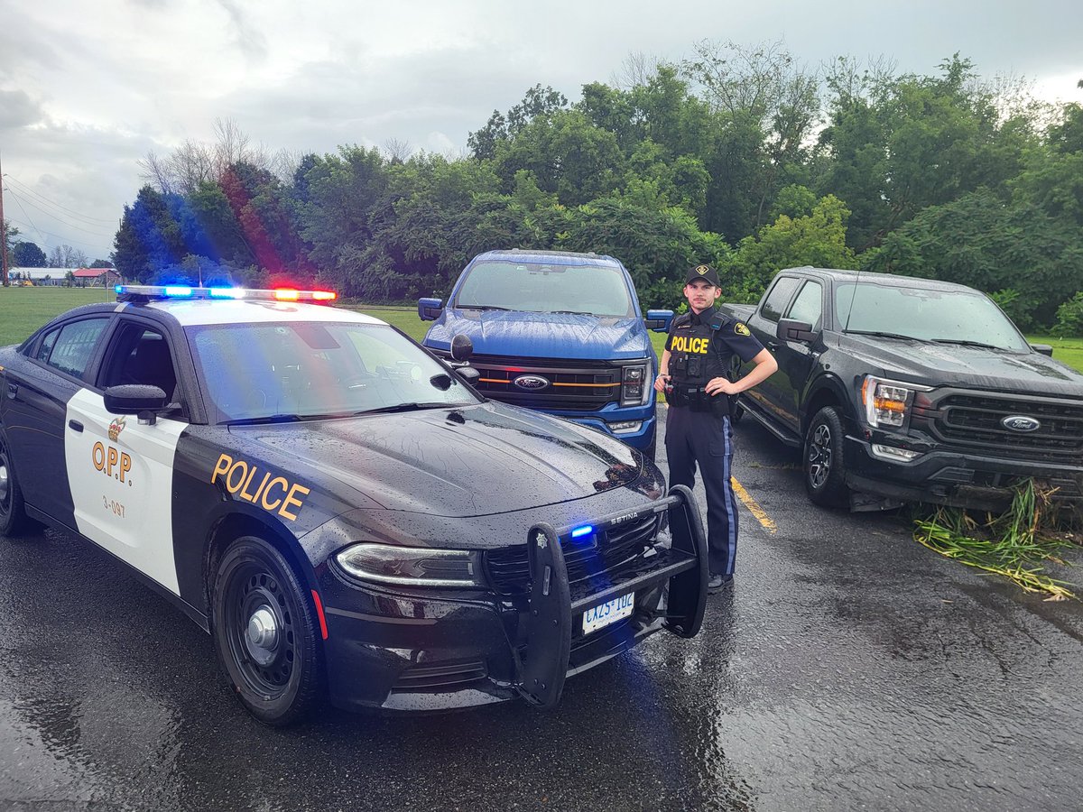 OPP_ER's tweet photo. #SDGOPP and #HSDOPP recovered two #stolen vehicles this morning on Highway 401. After the black truck had entered the ditch, police pursued the occupant on foot and took them into custody. A total of four people have been arrested and charged as a result of this occurrence. ^jd https://t.co/RWPRYuTflu