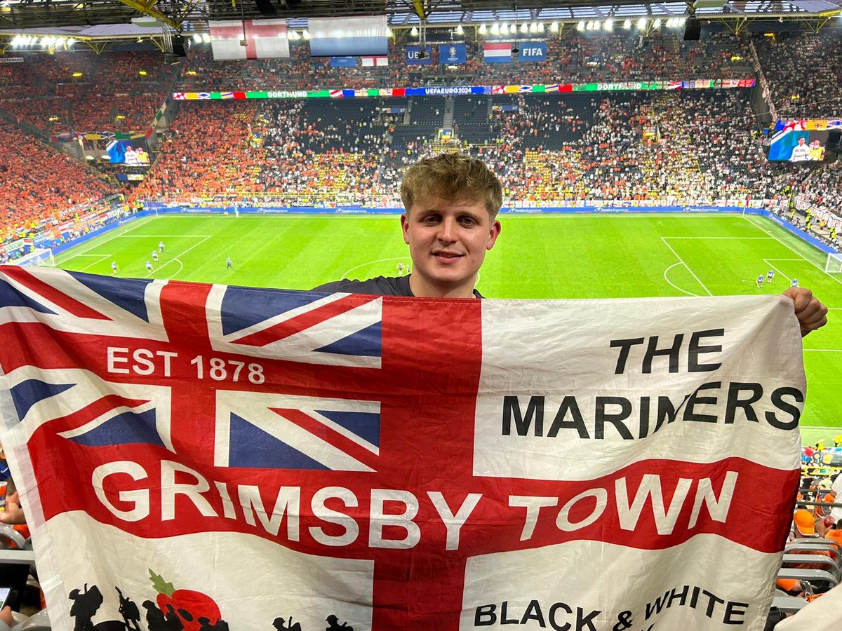 My nephew Max flying the <a href="/officialgtfc/">Grimsby Town F.C.</a> flag tonight at the game in Germany 🏴󠁧󠁢󠁥󠁮󠁧󠁿. Come England