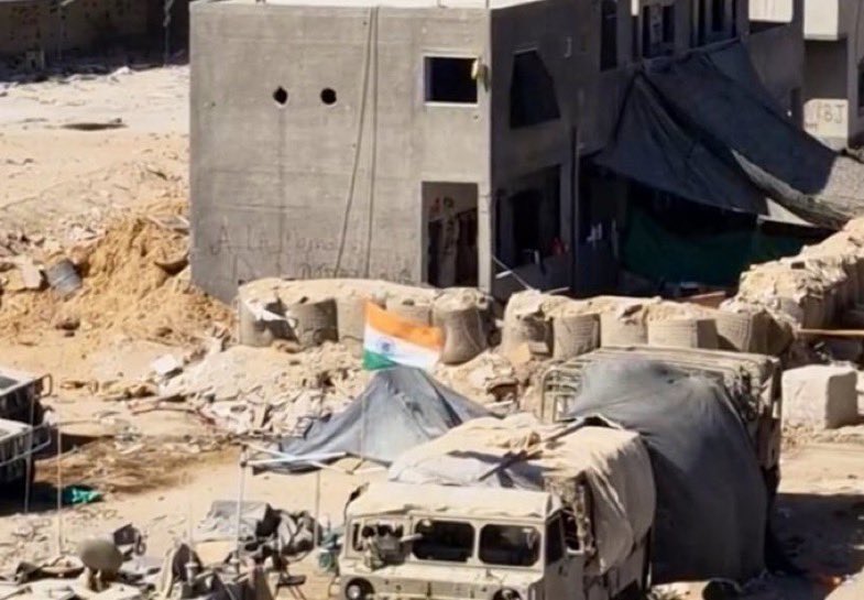TheSaviour's tweet photo. WHY ARE ISRAELI SOLDIERS RAISING THE INDIAN FLAG IN GAZA?! https://t.co/XnUFrJw1EV