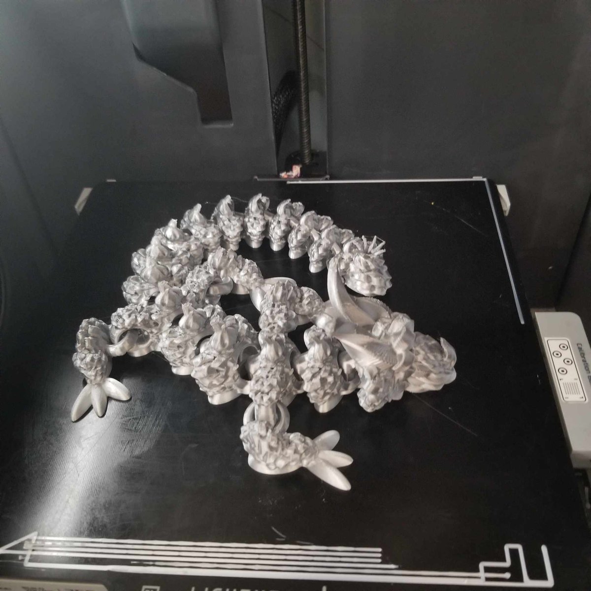 shakaworld's tweet photo. Unleash a mythical creature in your own home. Shakaworld3. Shakaworld3D's intricately designed Basket Weave Dragon awaits your 3D printing fun! Masterfully crafted detail, all scales adjustable. Visit https://t.co/Eaq5Mvh14Y now. #3DModel #ArticulatedDragon @Thangs3D @Thangs3D ​ designed in #tinkercad and #plasticity #3dprint #3dprinting #3dprinter
