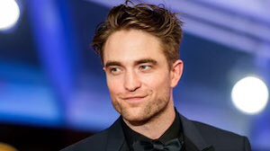 Actor Robert Pattinson dealt with an obsessed fan who had been camping outside his apartment by taking her out on a dinner date. "I just complained about everything in my life and she never came back."