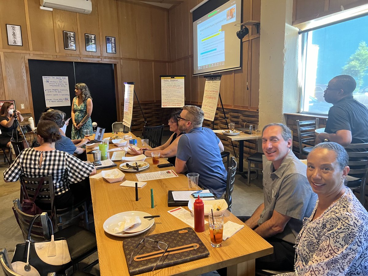 Portland Community Reinvestment Initiatives, Inc. Executive Director / CEO Kymberly Horner and Habitat for Humanity Portland Region President / CEO Steve Messinetti share conversations at the Housing Oregon-Metro Policy Council meeting.