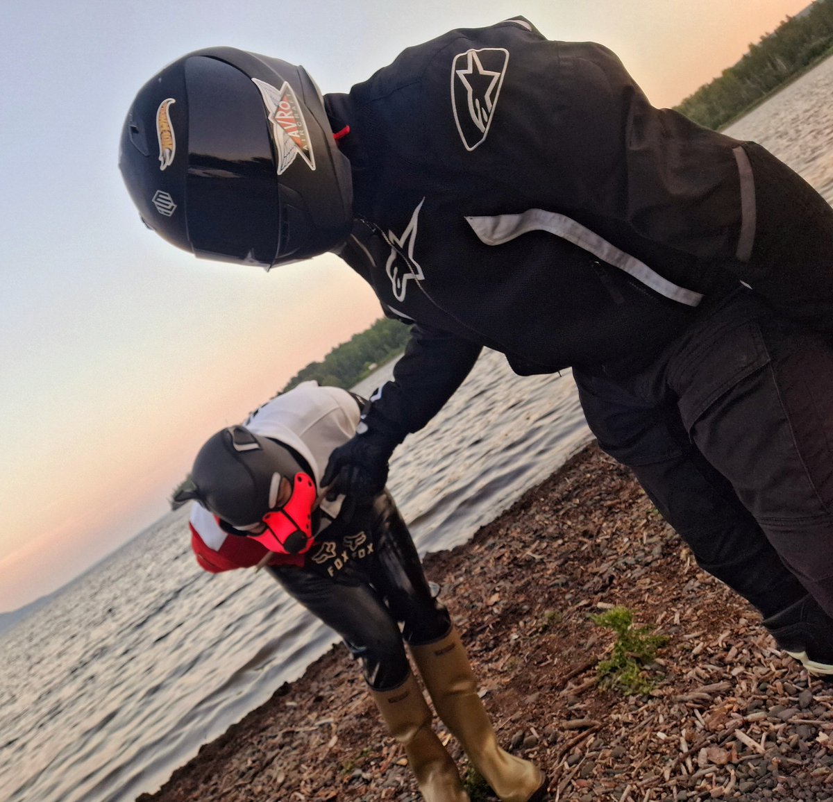 Racer is playing fetch the stick with my woofer 🐶🐕🏁☺️.