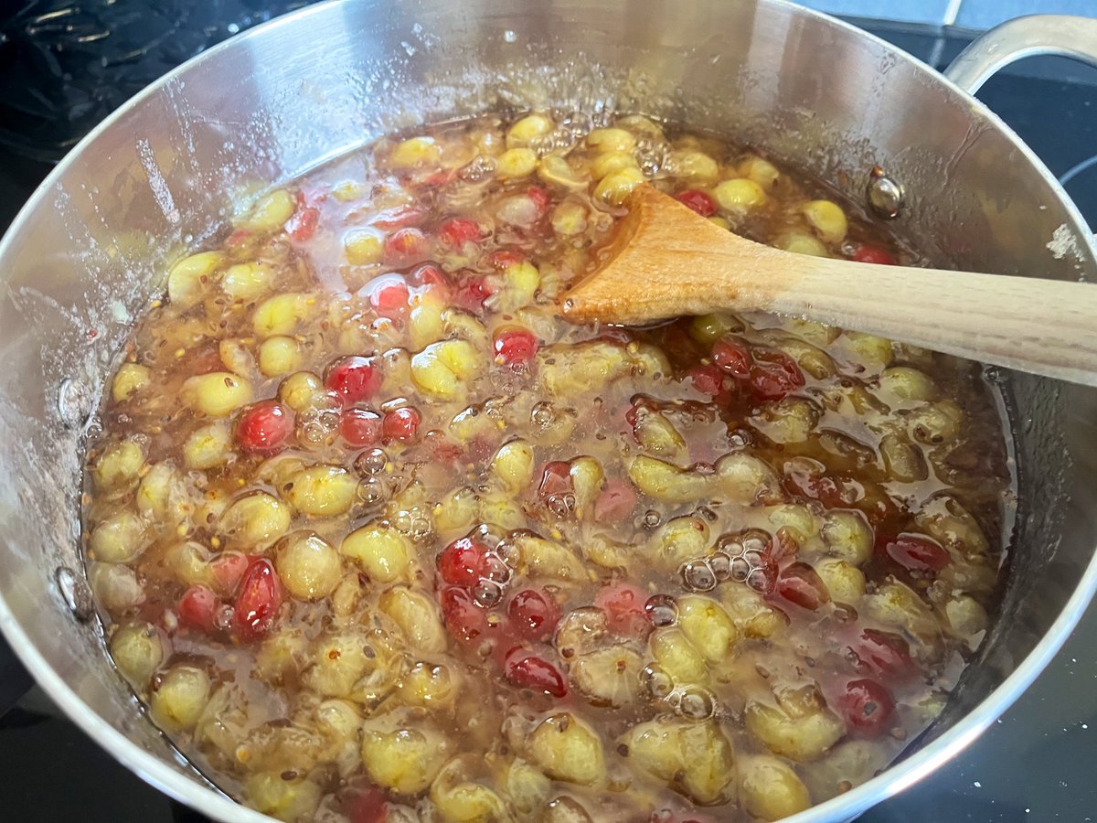 AllotmentOwner's tweet photo. Gooseberry jam in the making. 2kg of the berries! Finished making the jam and now can’t stop eating it! #gardeningwithjason #makingjam #gooseberries #allotmentlife https://t.co/3lACbFmsI1