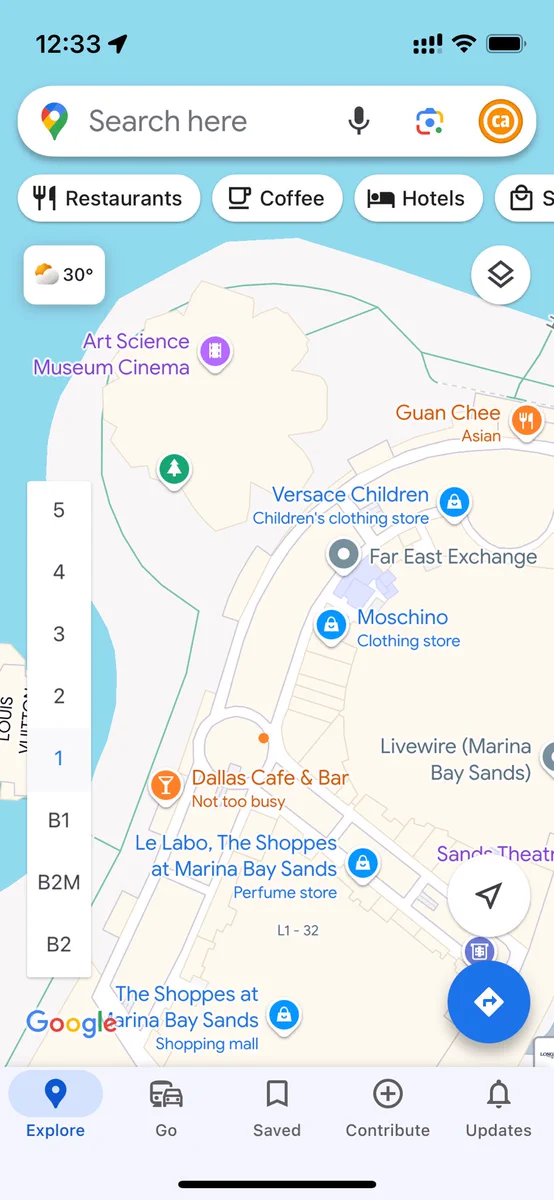 Google Maps iOS app showing a map view of Marina Bay Sands in Singapore showing various nearby locations.

The markers look different than usual. More rounded.