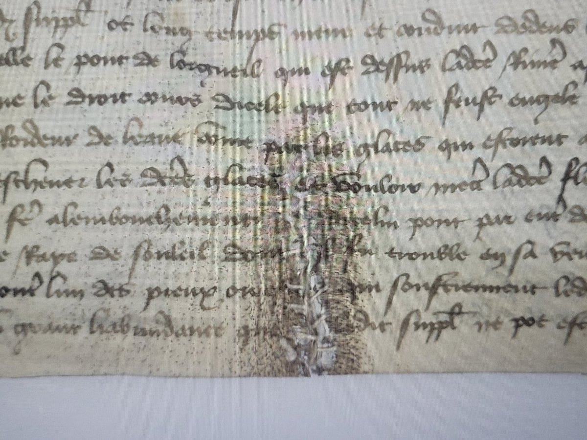 Repairs on a page of JJ175 from the Trésor des Chartes