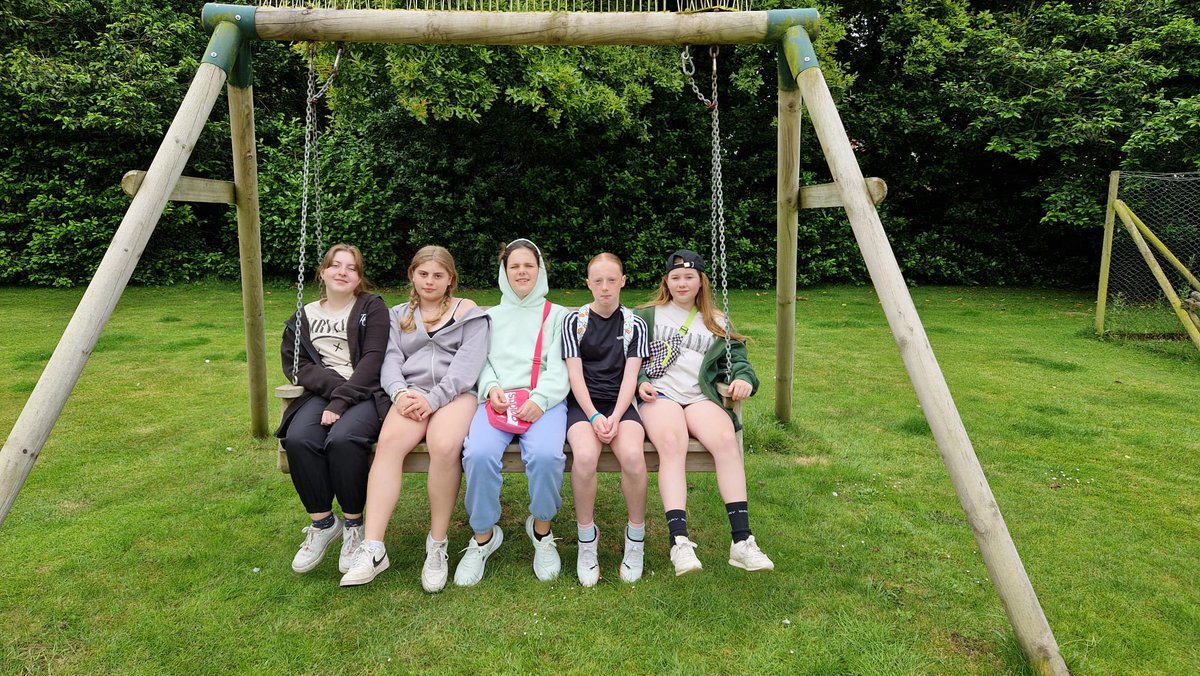 Girls relaxing in their boarding house garden!