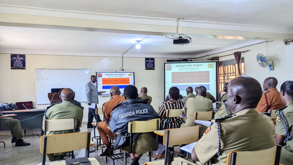 refugeelawproj's tweet photo. This morning, Dr. Pius Ojara, the Director of the Refugee Law Project, facilitated a training session on "Conflict and Stability: Understanding Refugee Protection" at the Police Senior Command and Staff College in Bwebajja. 
1/5 https://t.co/5jjKdFUhA8