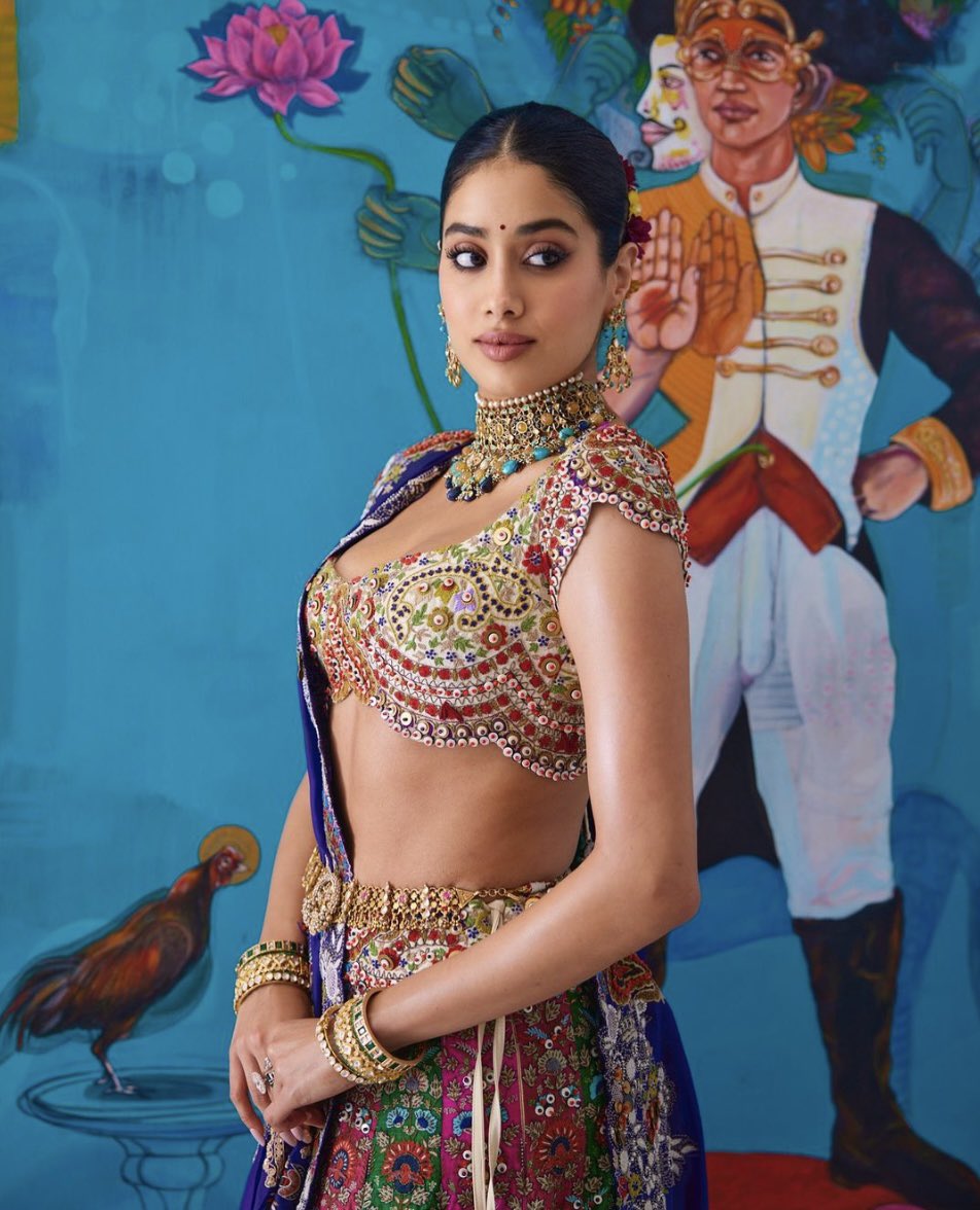 UiTV_Connect's tweet photo. 🌟 Janhvi Kapoor turns heads in a vibrant multi-coloured lehenga at Anant Ambani and Radhika Merchant's mehendi ceremony. #JanhviKapoor  #MehendiMagic #Fashionista #RadhikaMerchant https://t.co/br5IDyWY5G
