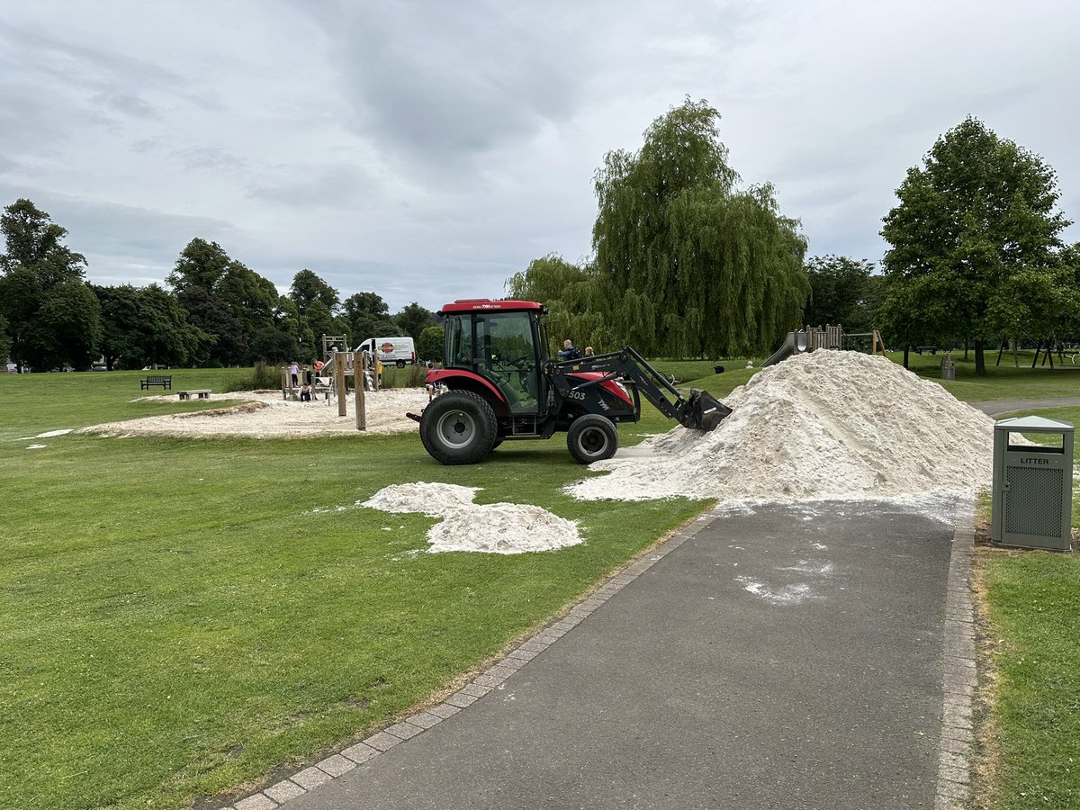 PEJ13's tweet photo. North Inch Park sand to top up sand play area dumped on path next to it! Prior to pic, little kids playing over pile of sand - not taped/roped off - accident waiting to happen (lovely lady from cafe came to intervene / highlight risks e.g. falling onto 🚜). @PerthandKinross https://t.co/2uDeill7uD
